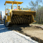 gravel road stabilizer clarke county iowa