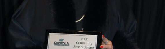 Kimes Receives Honored Community Service Award